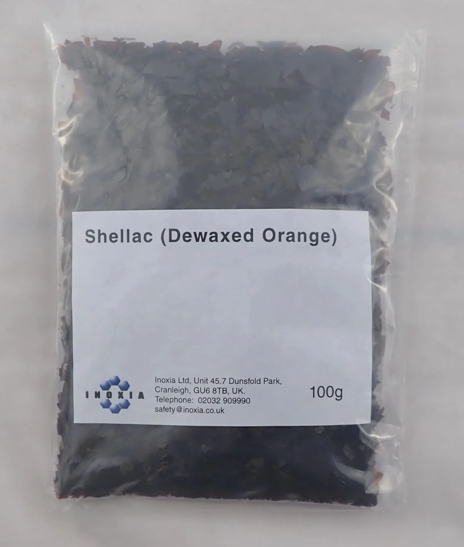 Płatki shellac (pomarańczowe, odewakowane) - Waga: 100 g - od Inoxia